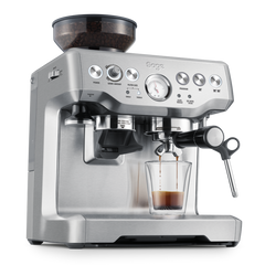 Sage espresso machine with a glass of coffee on a white background