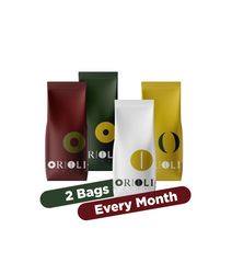 Four coffee bags with 'ORIOLI' branding and promotional text on a white background